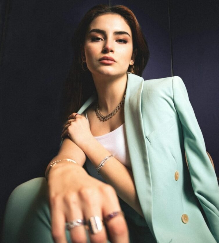 Studio Shot of a Young, Fashionable Woman in a Suit