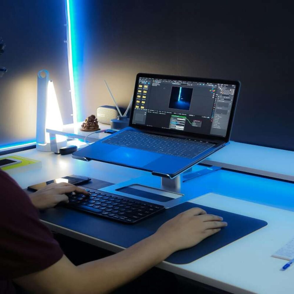 Person at a desk being productive on the computer
