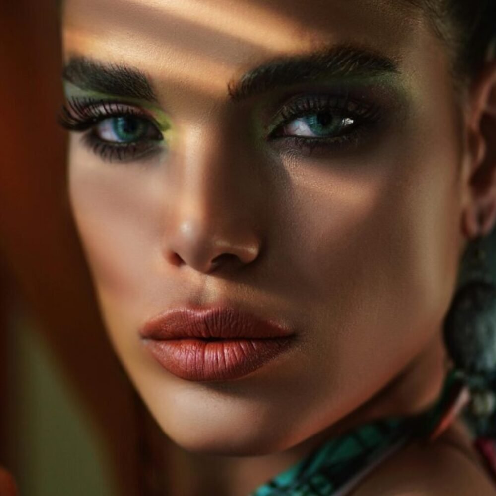 Girl with nice makeup showcasing her lips with lip oil